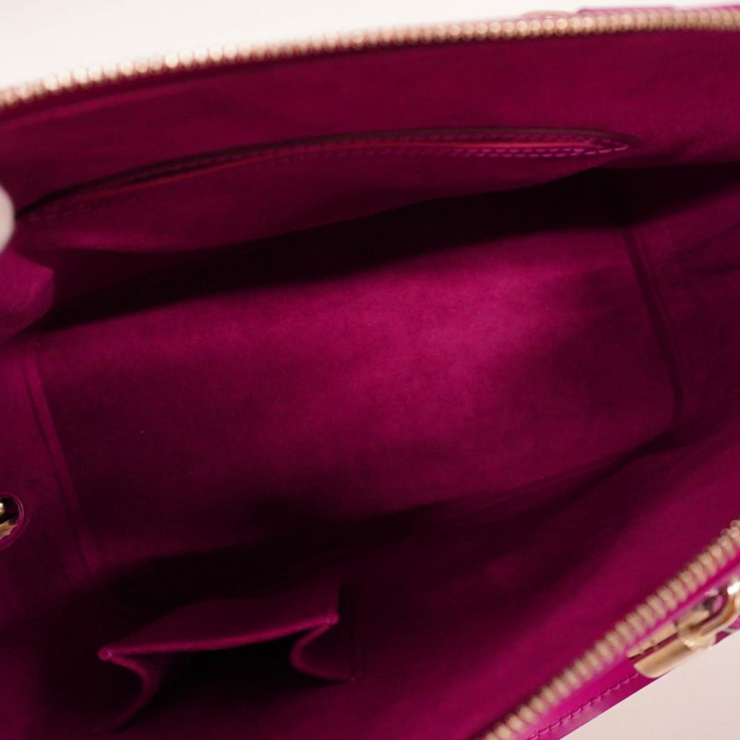 Louis Vuitton Alma Leather Handbag ()