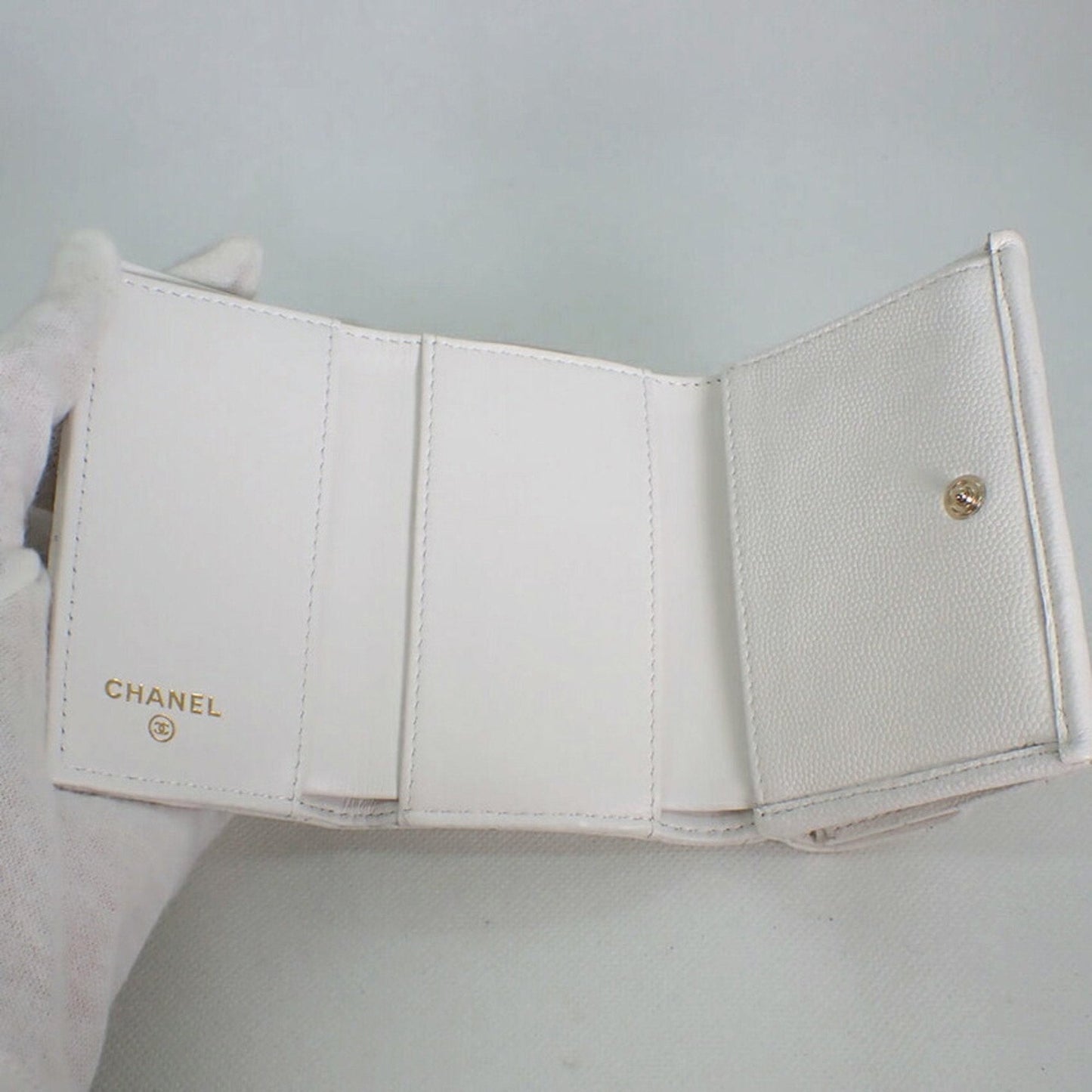 Luxury Chanel caviar skin white trifold wallet