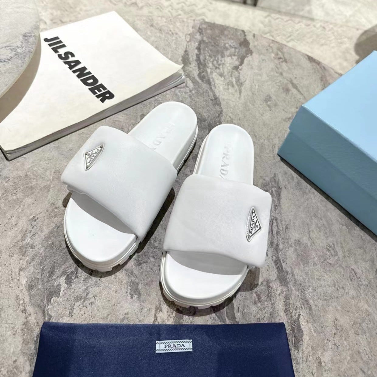 Luxury PradaSHEARLING SLIDES WHITE LAMBSKIN