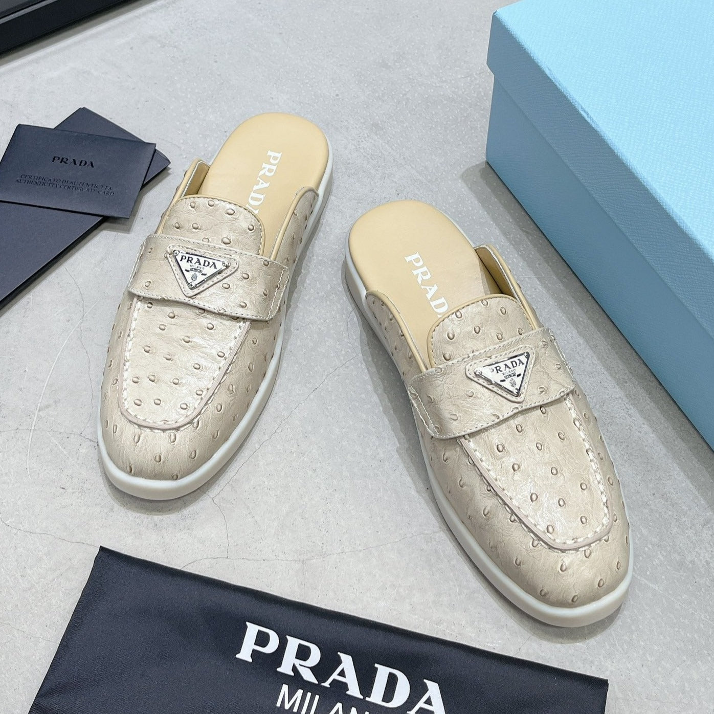 Luxury PradaOSTRICH PATTERN MULES CREAMY WHITE CALFSKIN
