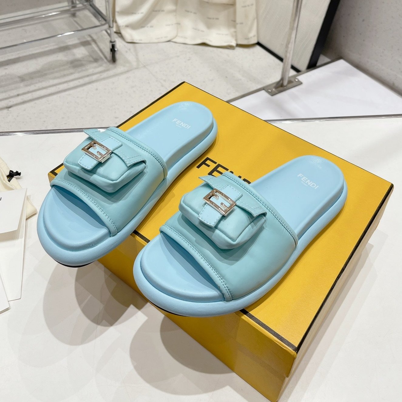 Luxury FendiLuxury FendiBAGUETTE SLIPPERS IN SKY BLUE LAMBSKIN WITH GOLD HARDWARE