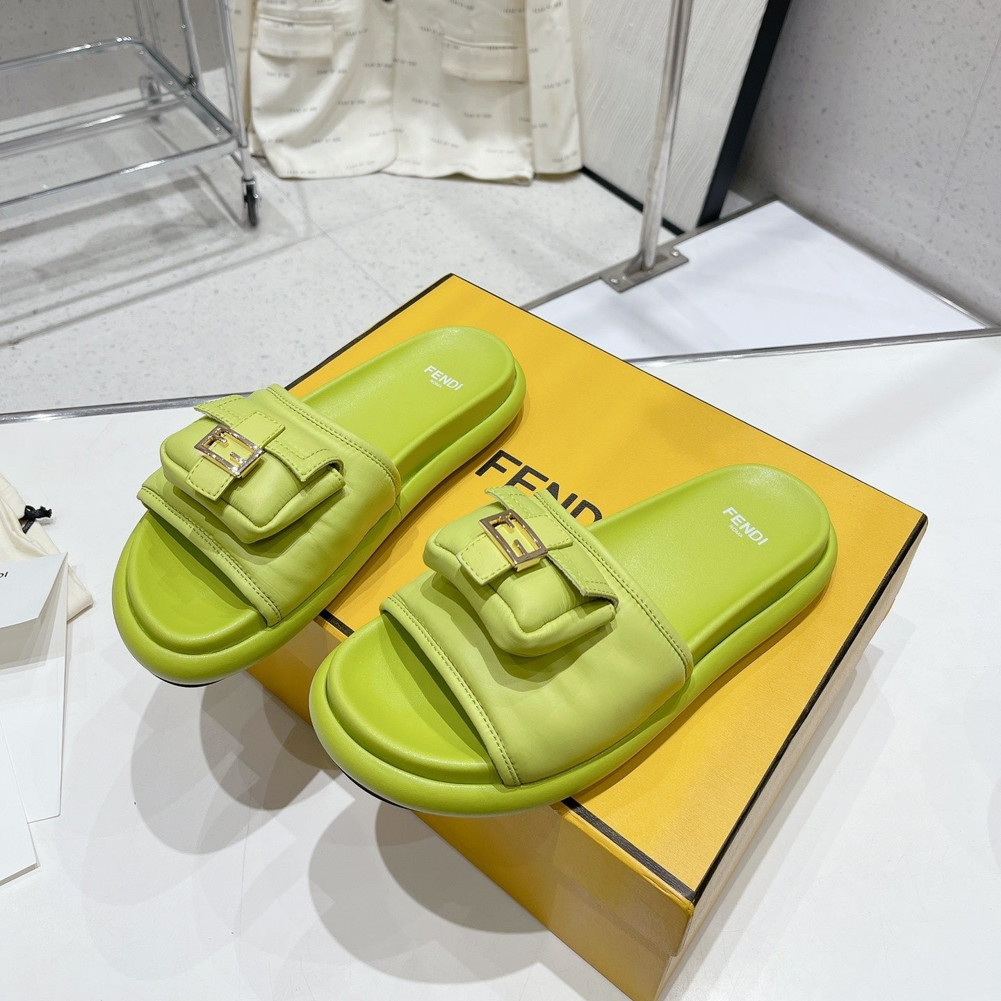 Luxury FendiLuxury FendiBAGUETTE SLIPPERS IN PEAR GREEN LAMBSKIN WITH GOLD HARDWARE