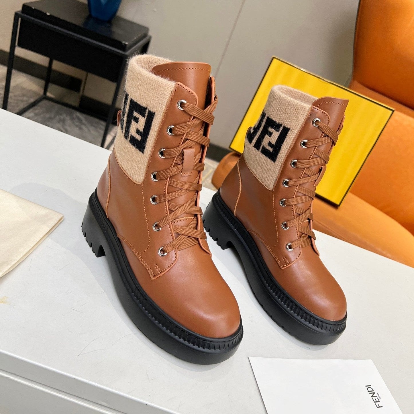 Luxury FendiLuxury FendiMARTIN BOOTS IN BRONZE BROWN CALFSKIN AND FUR