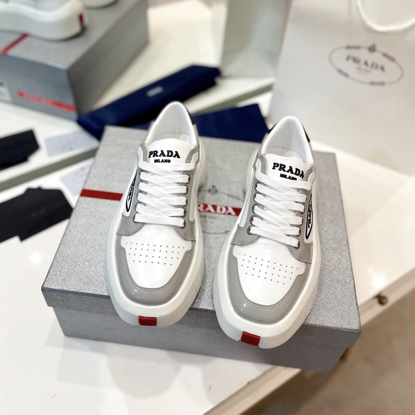 Luxury PradaDOWNTOWN THICK-SOLE SNEAKERS WHITE AND GRAY CALFSKIN