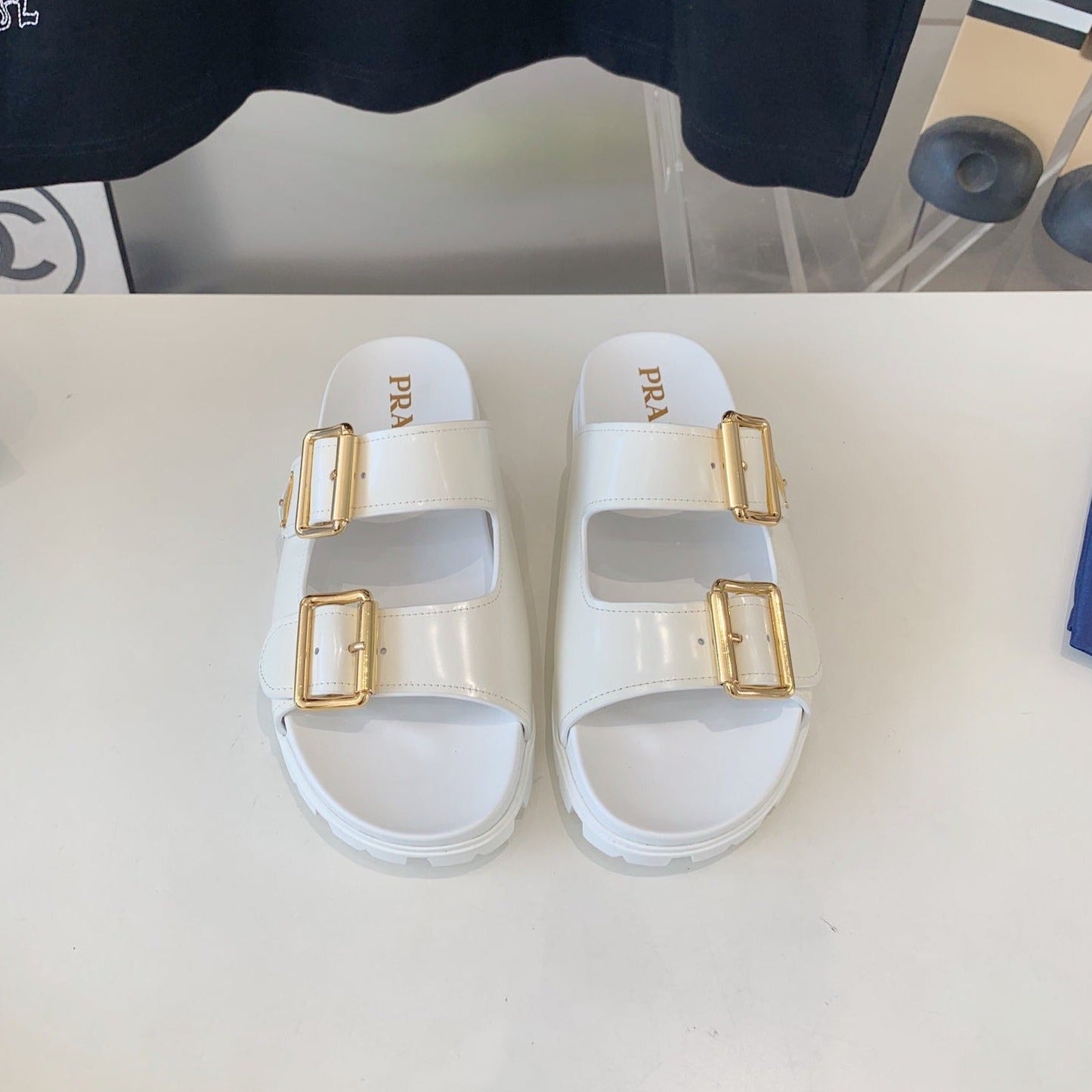 Luxury PradaSTRAP SLIDES SANDALS GLOSSY WHITE CALFSKIN