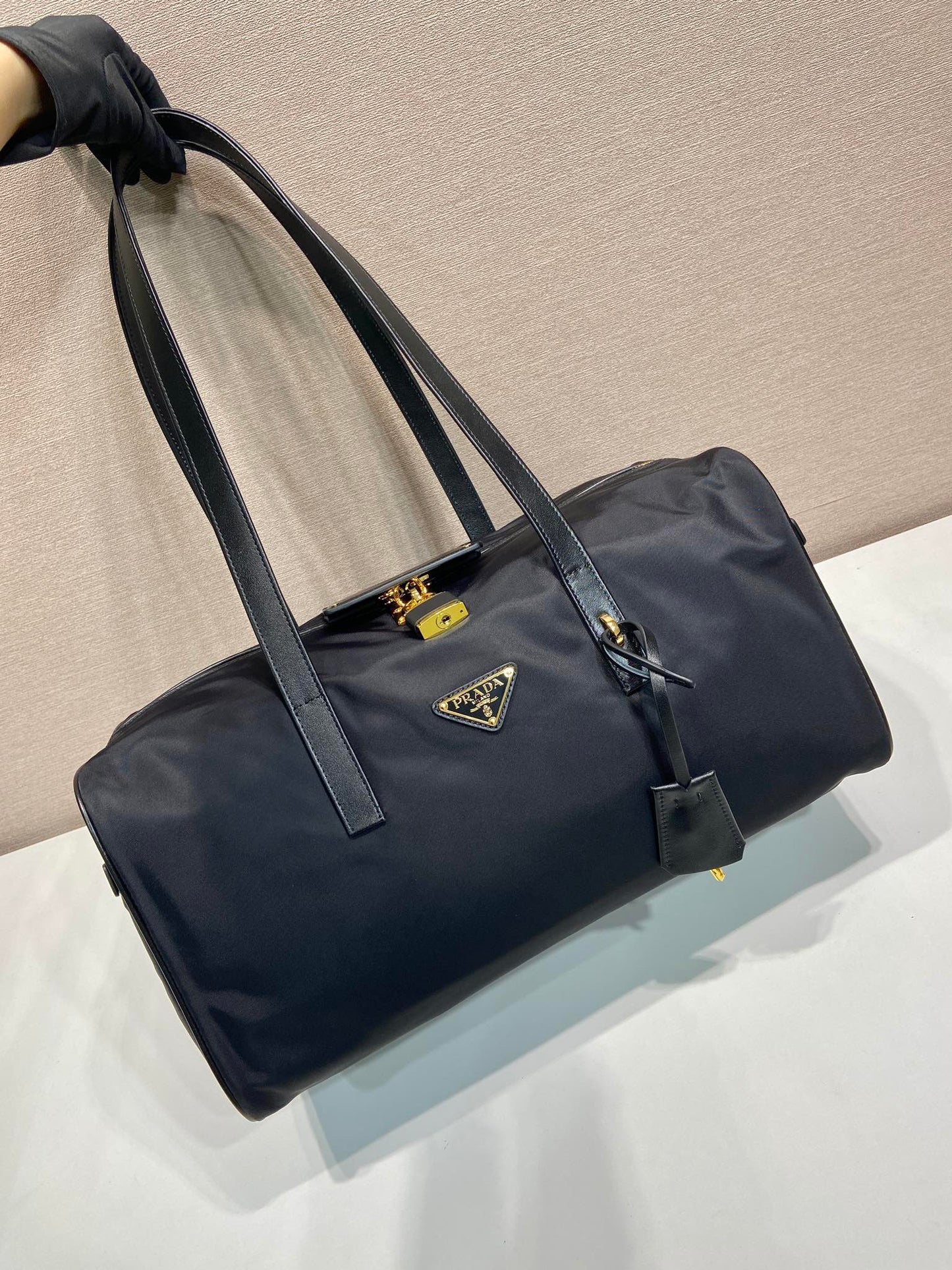 Luxury PradaTRAVEL BAG 40 IN BLACK WATERPROOF FABRIC GOLD PADLOCK