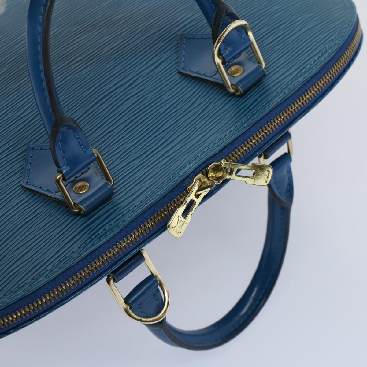 Louis Vuitton Alma Leather Handbag ()