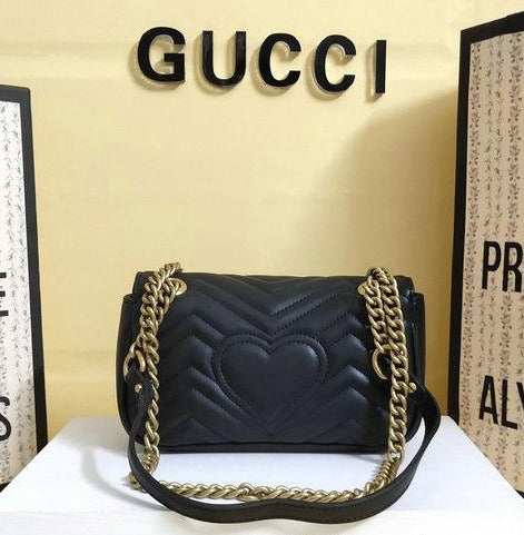 Women's Luxury Gucci GG Marmont matelassé mini bag