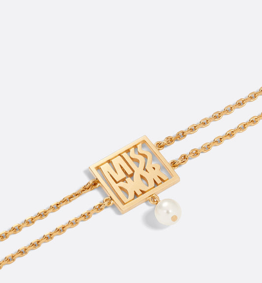Miss Luxury Dior Bracelet Gold Finish Metal And A White Resin Pearl