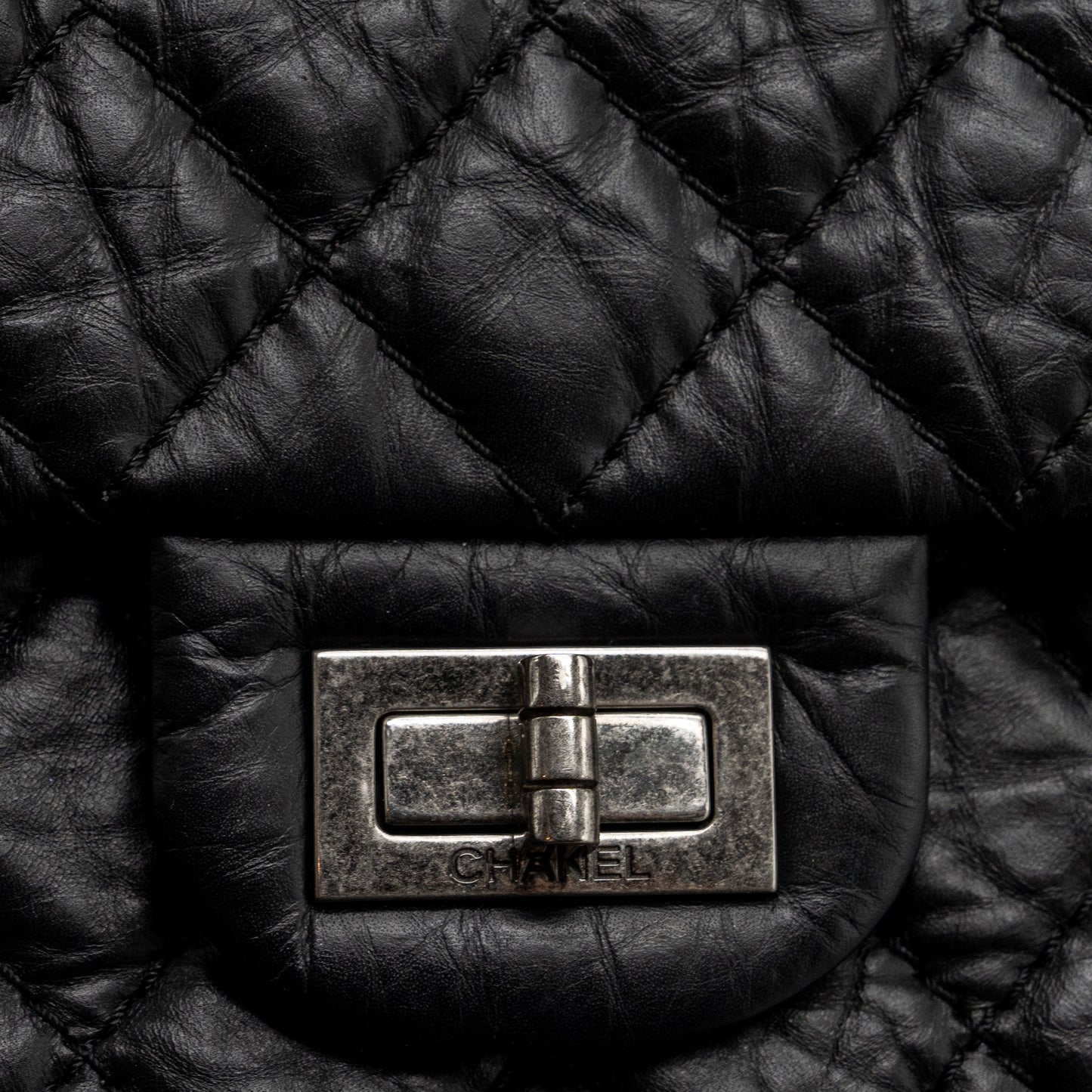 Chanel small 2.55 reissue flap bag aged calfskin black ruthenium SHW