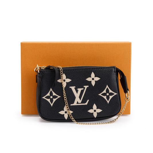 Louis Vuitton 2023 Bicolor Monogram Empreinte Leather Mini Pochette Accessories