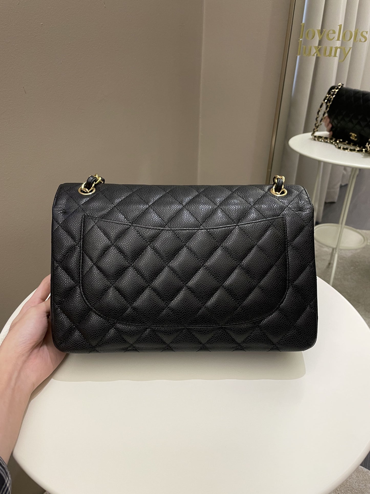 Luxury Chanel Classic Quilted Jumbo Double Flap Black Caviar