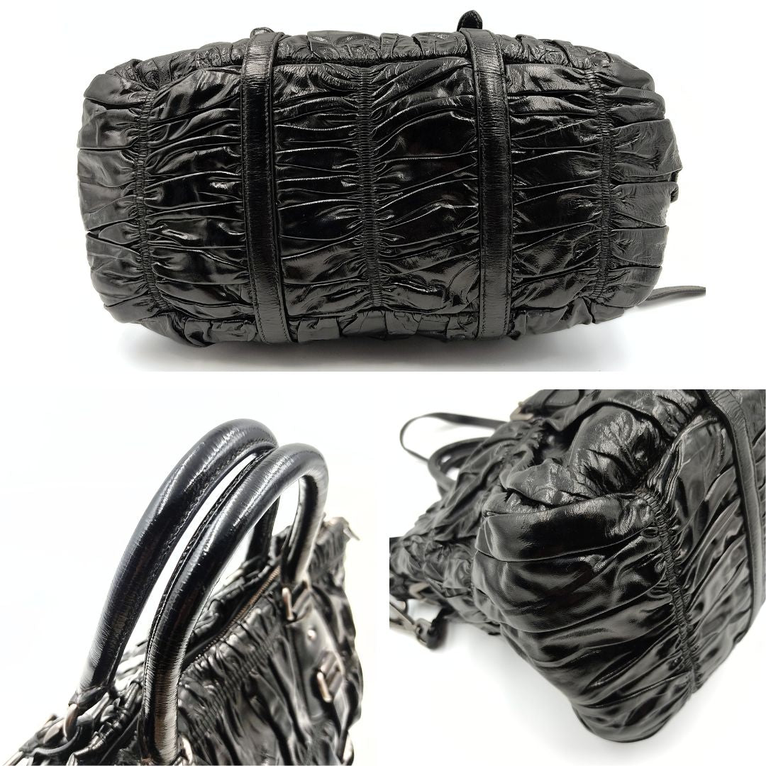 Luxury PradaShopper shoulder bag in black Gaufre paint