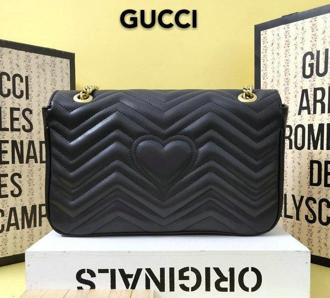 Women's Luxury Gucci GG Marmont medium matelassé shoulder bag