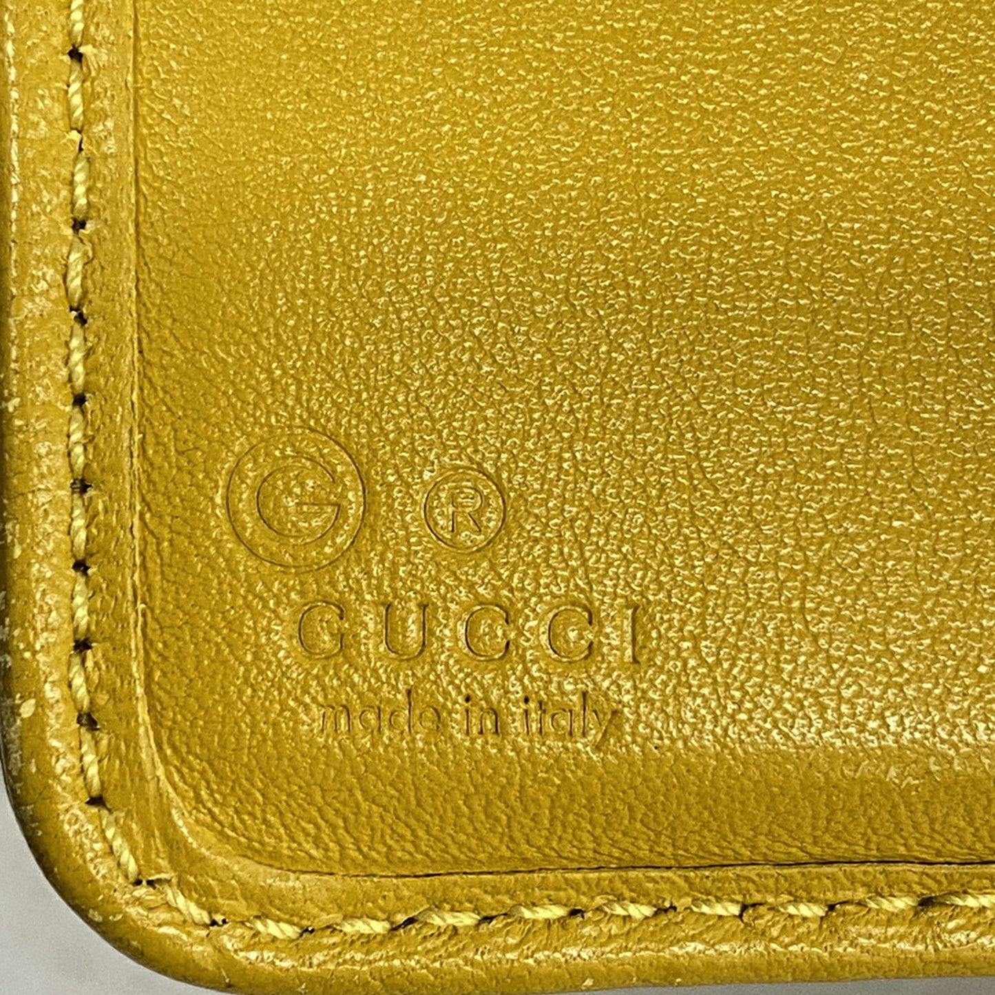 Gucci Micro Guccissima Leather Wallet