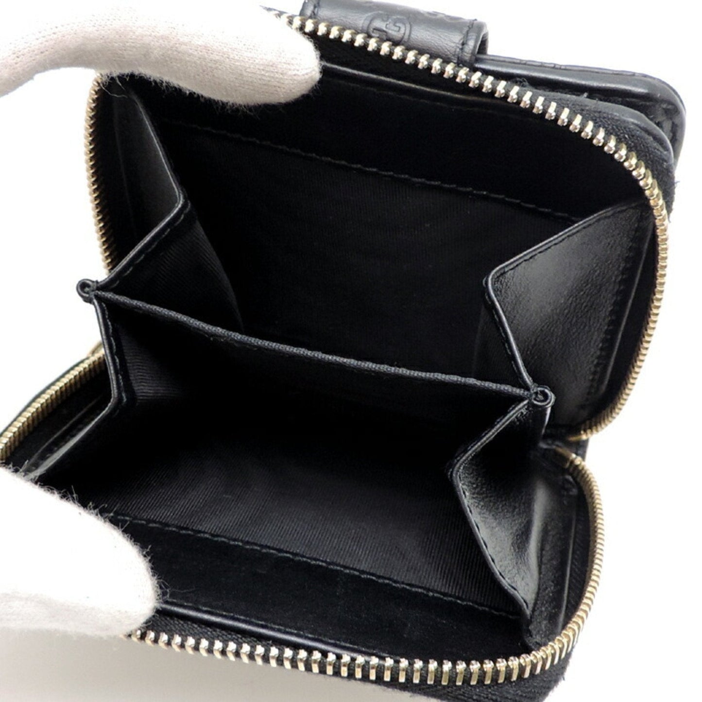 Gucci Micro Guccissima Leather Wallet ()