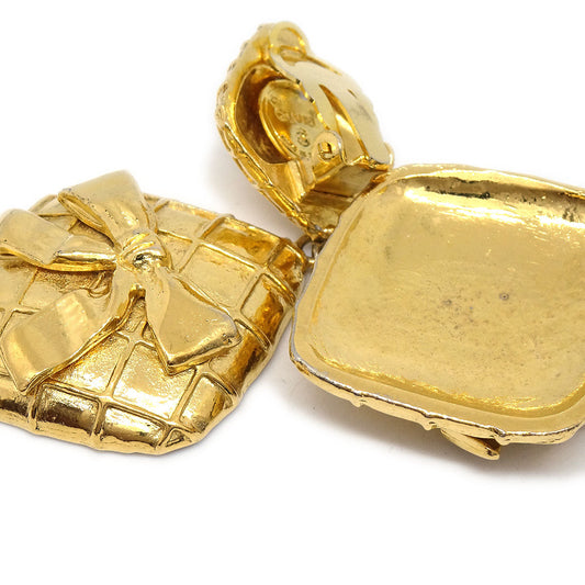 Luxury Chanel 1980s Bow Dangling Earrings Clip-On Gold