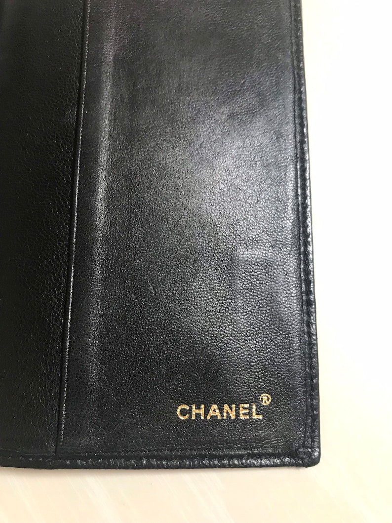 Luxury Chanel Vintage black stitched leather book cover, diary cover, checkbook case etc