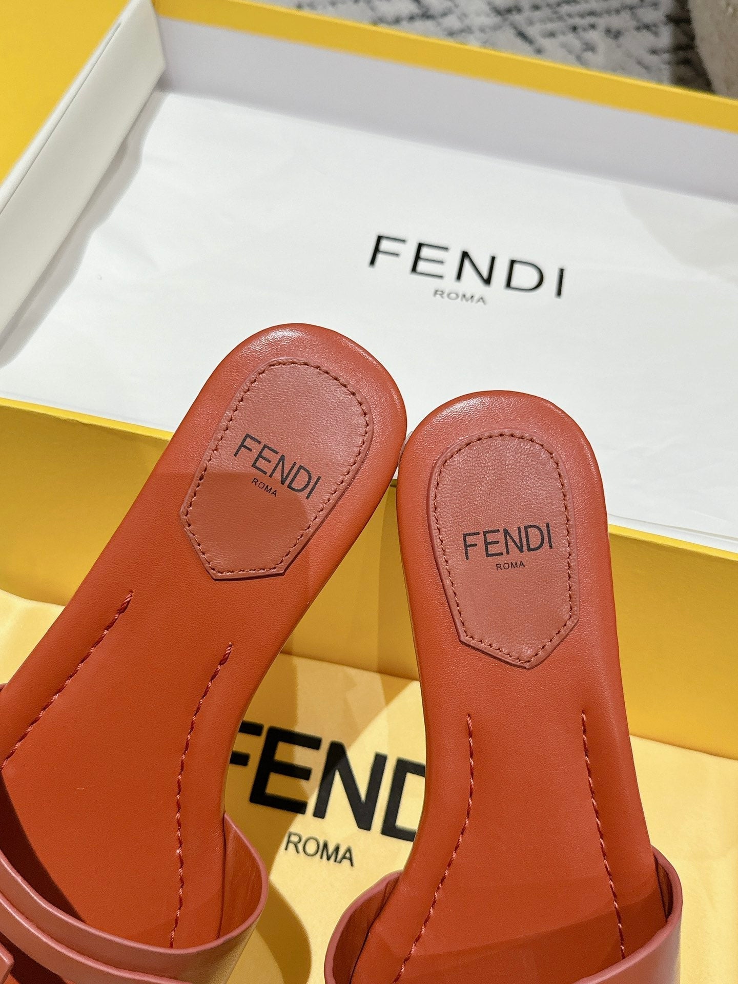 Luxury FendiFF Baguette Rust Leather Slide