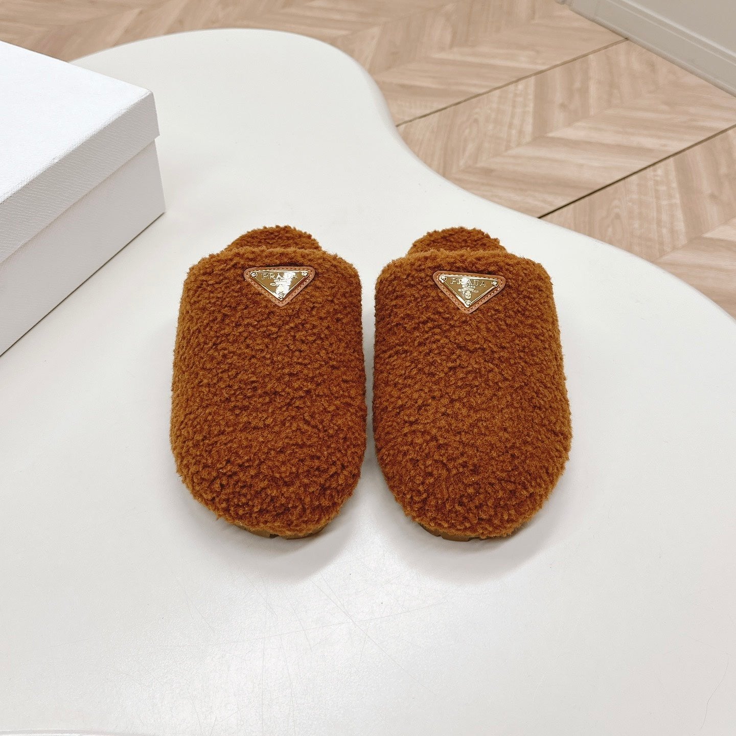 Luxury PradaMULES ATTACHED TRIANGLE LOGO IN BRONZE BROWN SHEARLING