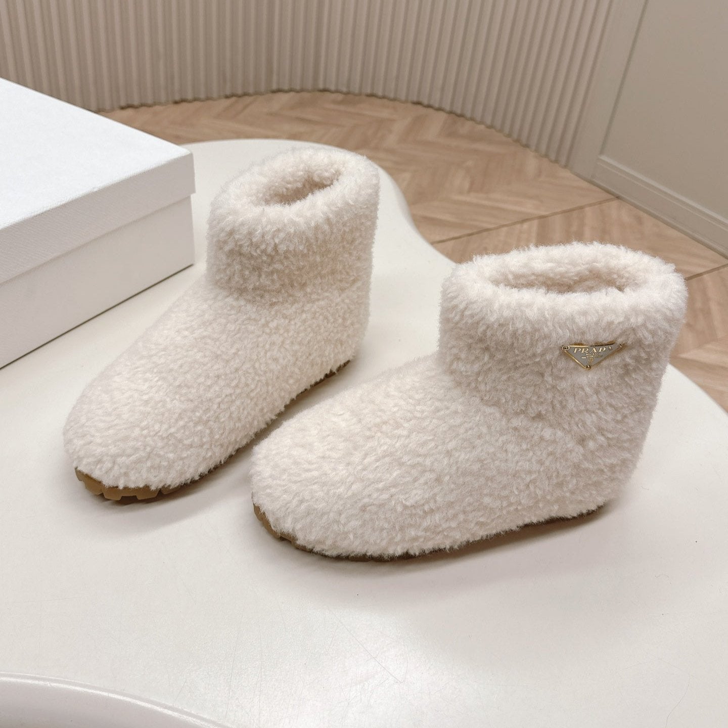 Luxury PradaSNOW ANKLE BOOTS IN WHITE SHEARLING