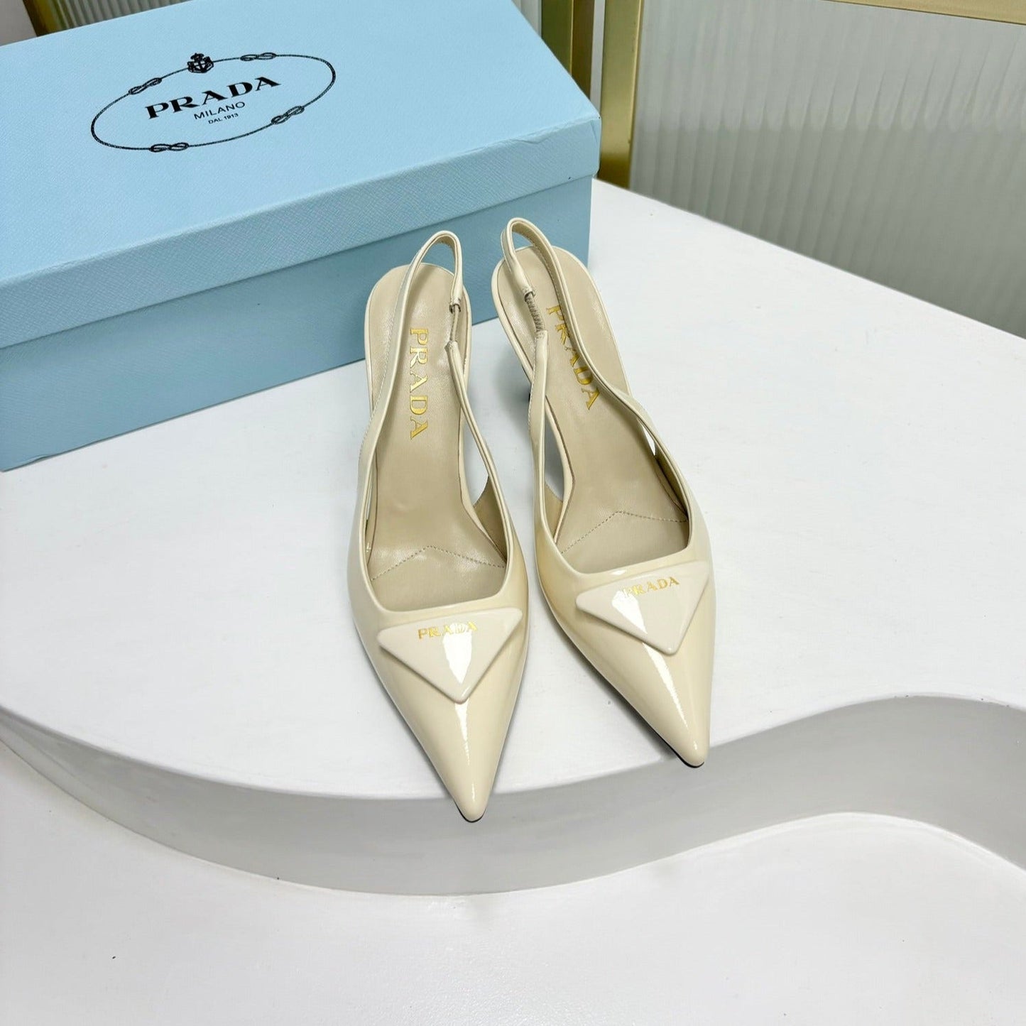 Luxury PradaPATENT LEATHER SLINGBACK PUMPS 50 CREAMY WHITE