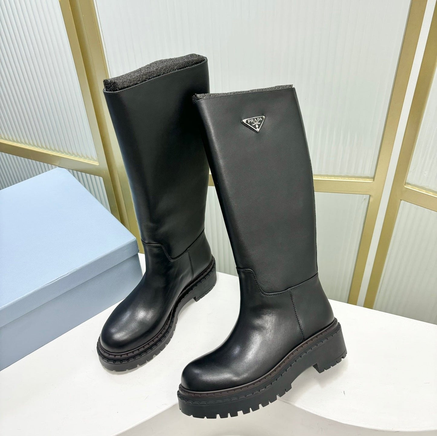Luxury PradaKNEE BOOTS WITH TRIANGLE LOGO IN BLACK CALFSKIN