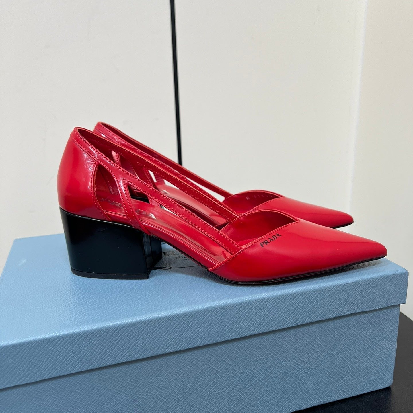 Luxury PradaBRUSHED CUT-OUT PUMPS IN RED CALFSKIN