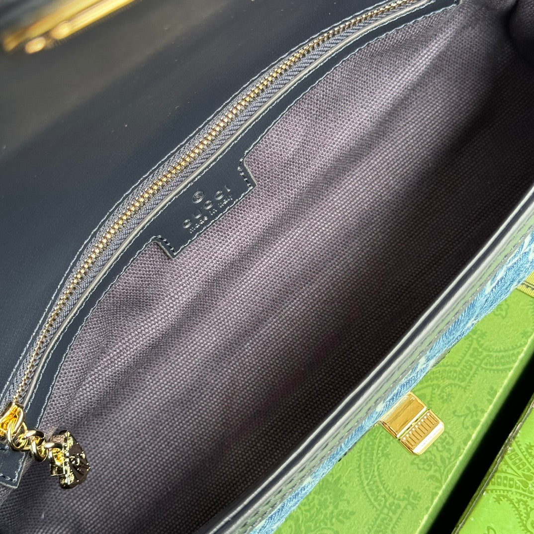 Luxury Gucci LUCE SMALL SHOULDER BAG 27 IN BLUE EMBOSSED DENIM AND BLACK CALFSKIN TRIM GOLD HARDWARE