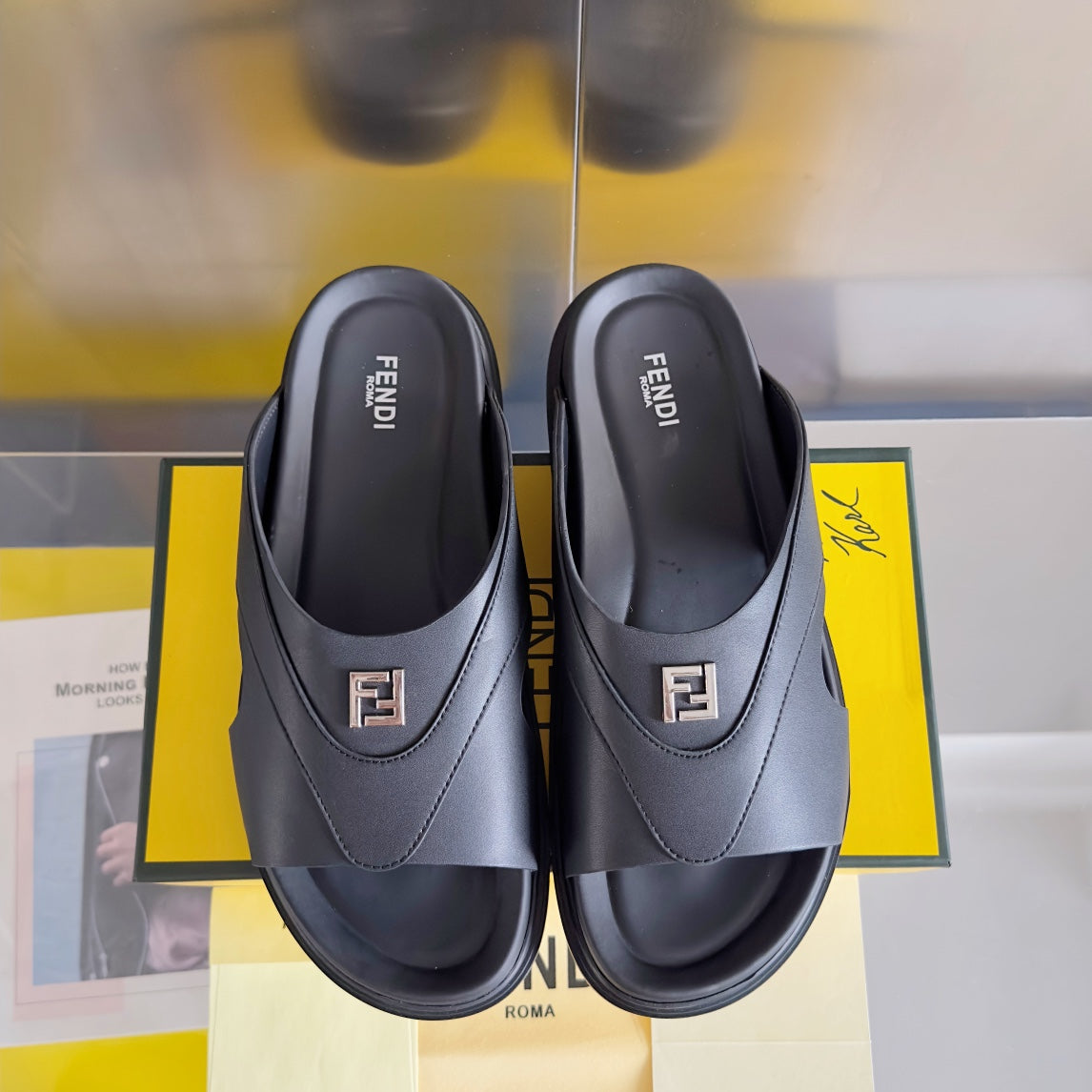 Luxury FendiLuxury FendiDIAGONAL ONE-STRAP SLIDE IN BLACK CALFSKIN AND RUBBER