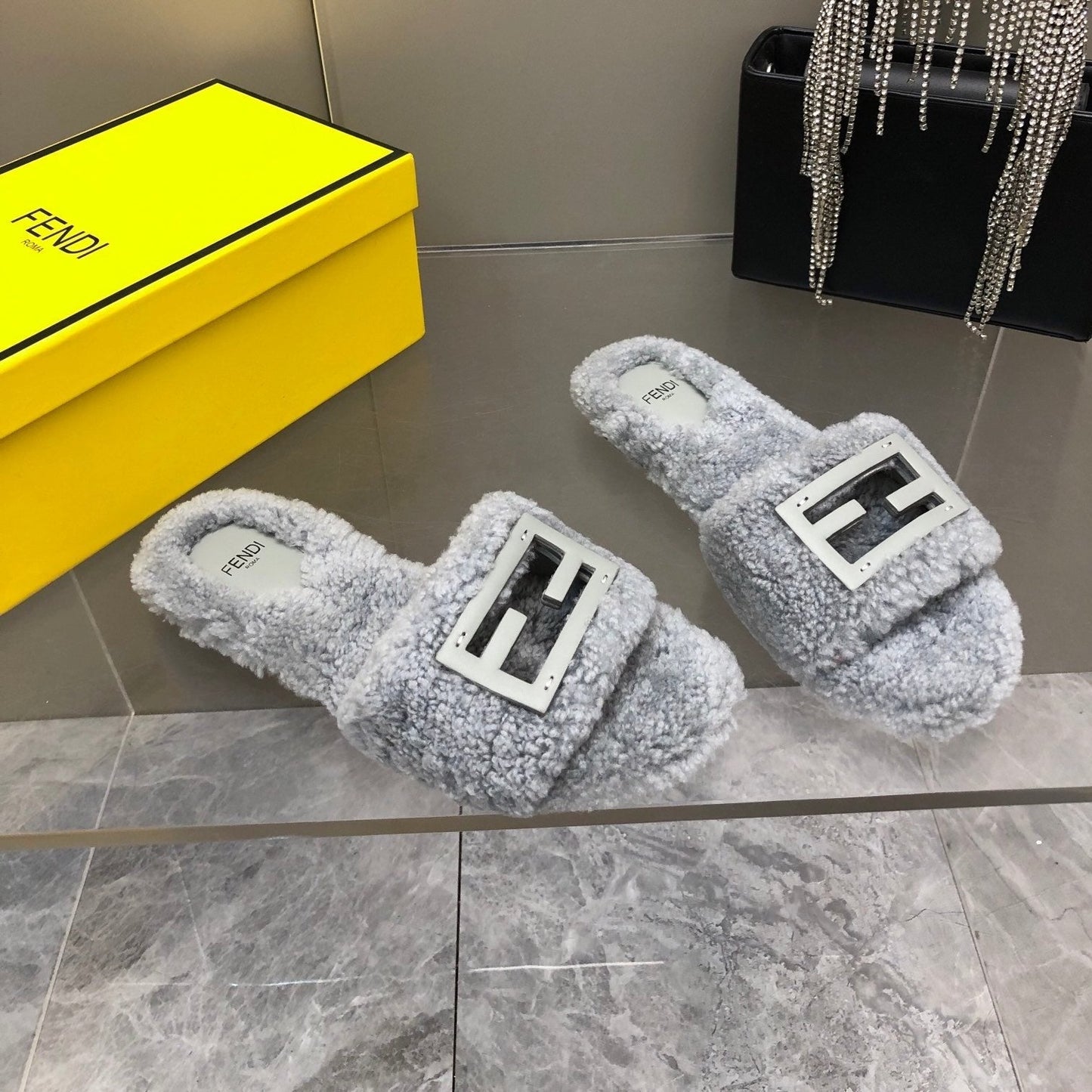 Luxury FendiLuxury FendiBAGUETTE SLIDE SLIPPERS IN GREY WOOL