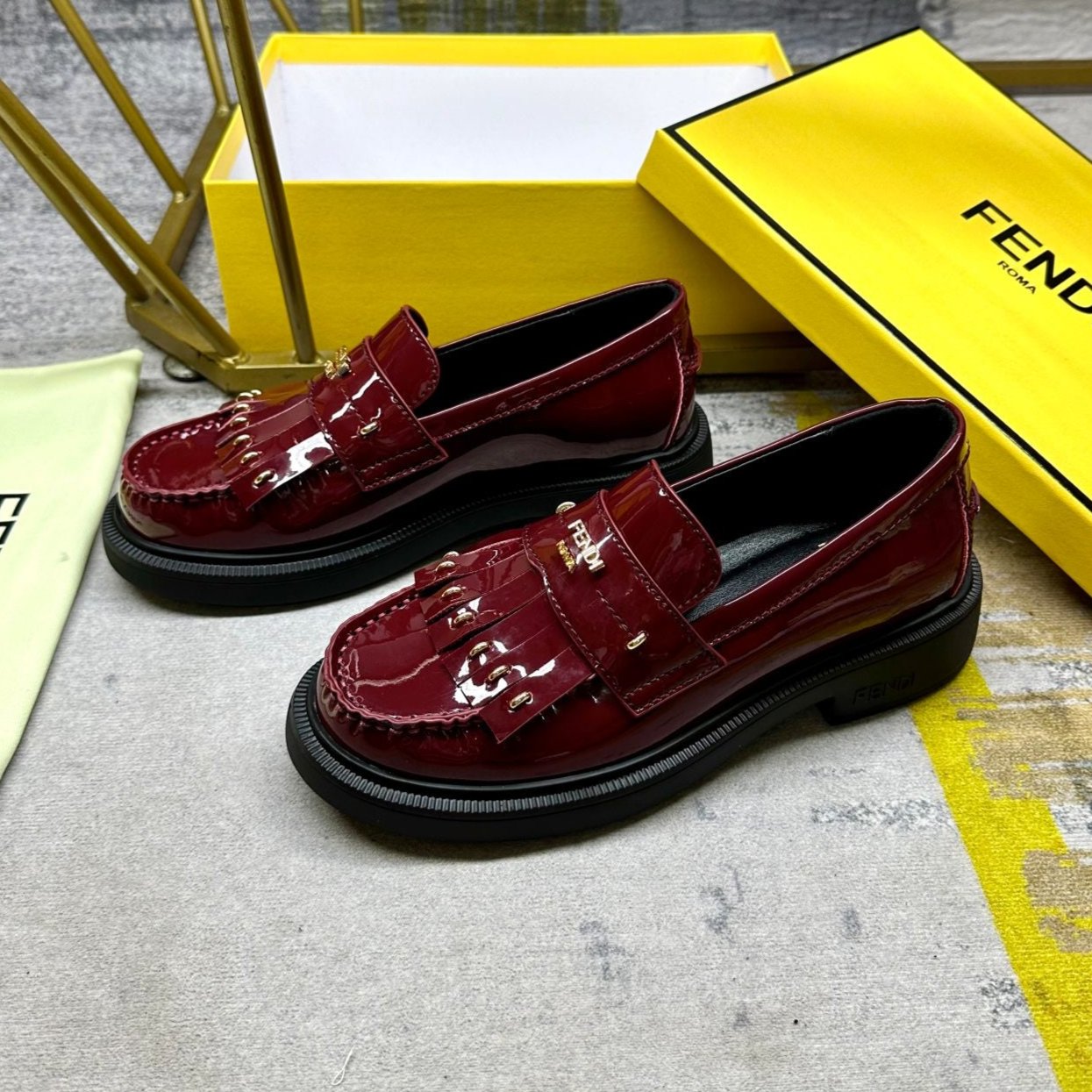 Luxury FendiLuxury FendiBAGUETTE LOAFERS IN MAROON RED CALFSKIN WITH GOLD HARDWARE