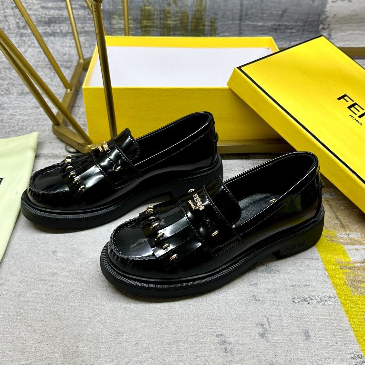 Luxury FendiLuxury FendiBAGUETTE LOAFERS IN BLACK CALFSKIN WITH GOLD HARDWARE