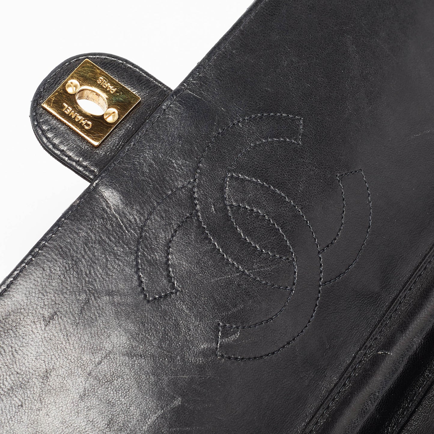 CHANEL Black Quilted Leather CC Flap Bag