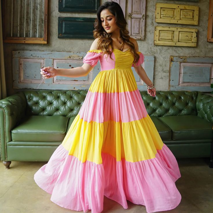 Designer dresses collection featuring evening dresses, party dresses, and maxi dresses crafted from premium fabrics for elegant luxury fashion.