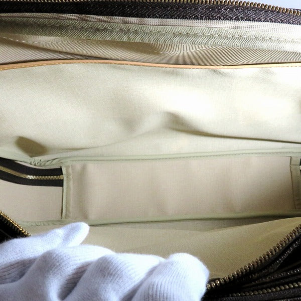 Louis Vuitton Monogram Alize 24H Bag M41399