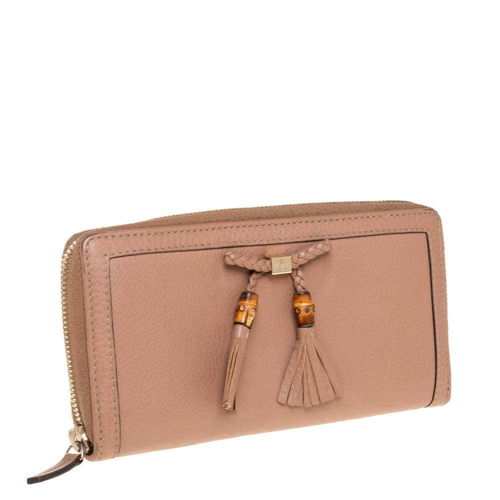 Luxury Gucci Trending 2025 Beige Leather Bamboo Tassel Bow Zip Around Wallet..