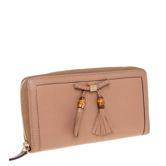 Luxury Gucci Trending 2025 Beige Leather Bamboo Tassel Bow Zip Around Wallet..