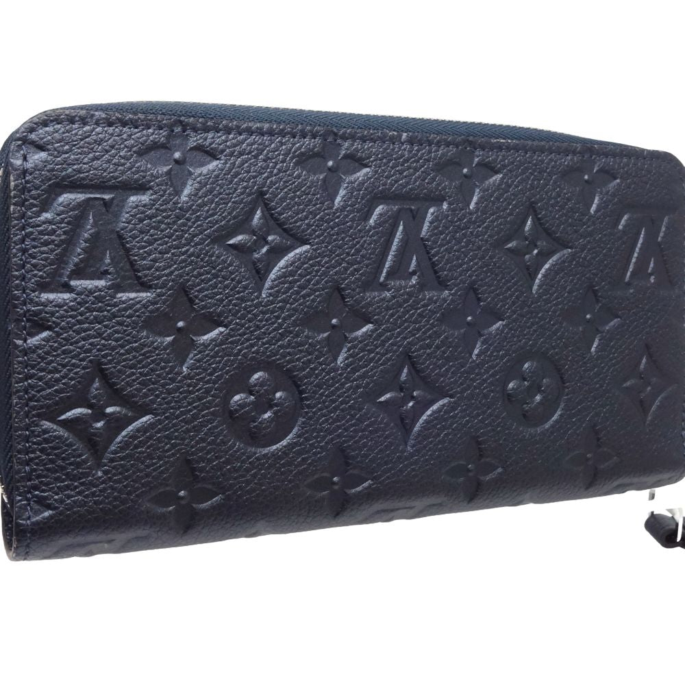 Louis Vuitton Zippy Wallet Flower Studs