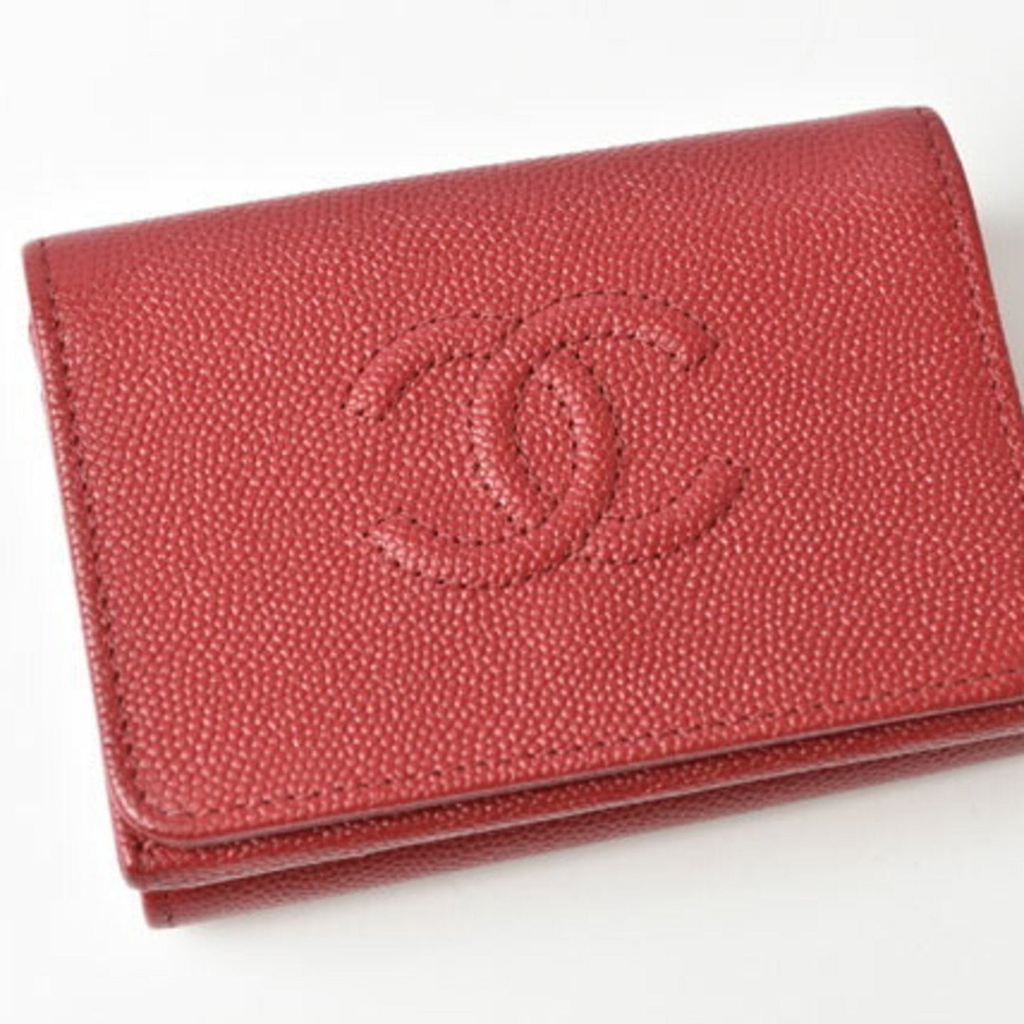 Luxury Chanel wallet  here mark caviar skin dark red