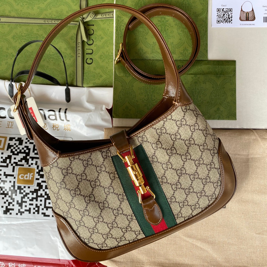 Luxury Gucci gg jackie small 28cm beige monogram canvas brown calfskin