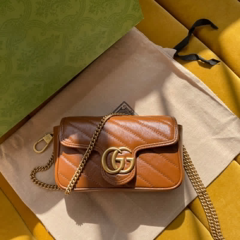 Luxury Gucci GG MARMONT MINI 16 BAG IN CINNAMON BROWN CALFSKIN