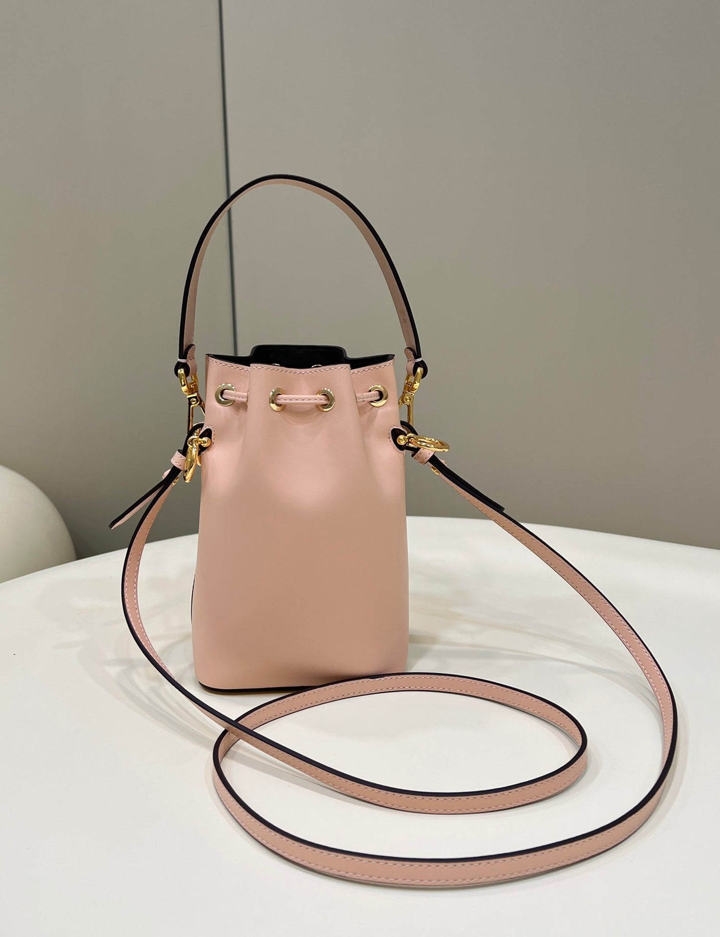 Luxury FendiMON TRESOR MINI 18 BAG IN PEACHY PINK CALFSKIN FF WITH GOLD HARDWARE