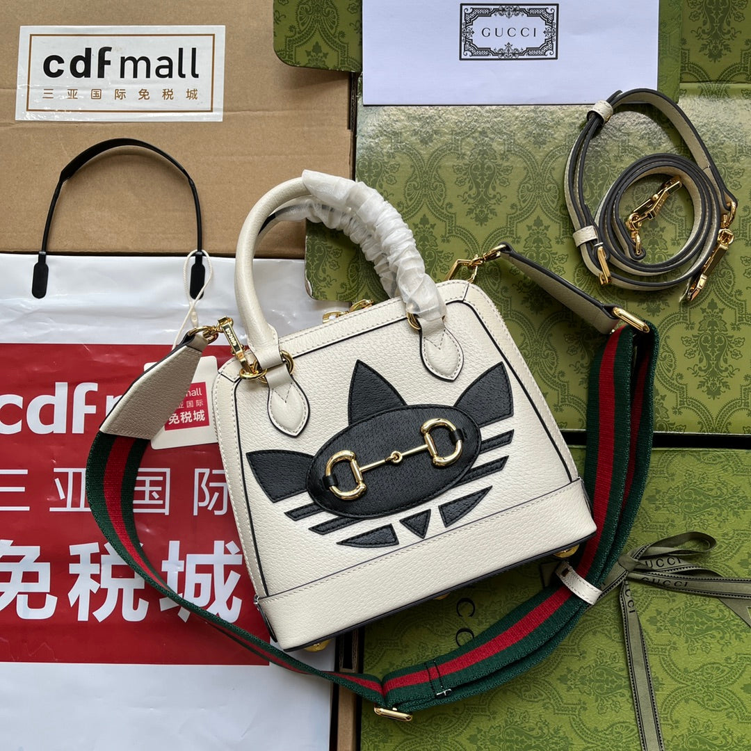 Luxury Gucci GGxADIDAS HORSEBIT 1955 TOTE BAG 20 WITH WEB STRAP IN WHITE MIX BLACK CALFSKIN GOLD HARDWARE