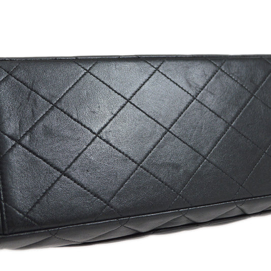 CHANEL 1994-1996 Black Lambskin Classic Flap Maxi 75100