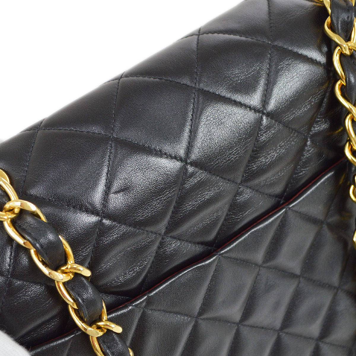 CHANEL 1994-1996 Black Lambskin Classic Flap Maxi 75100