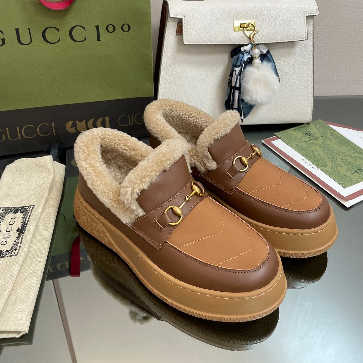 Luxury Gucci GG LOAFER IN PEANUT BROWN AND CHOCOLATE BROWN CALFSKIN WITH BEIGE WOOL LINING