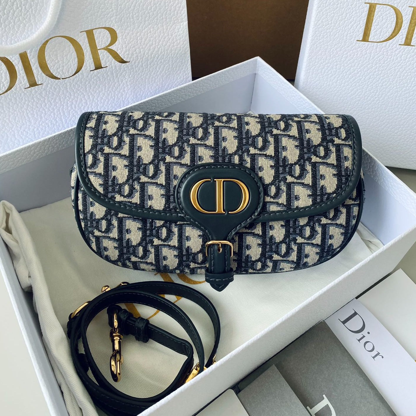 Luxury Diormedium east west bobby 22cm blue oblique canvas