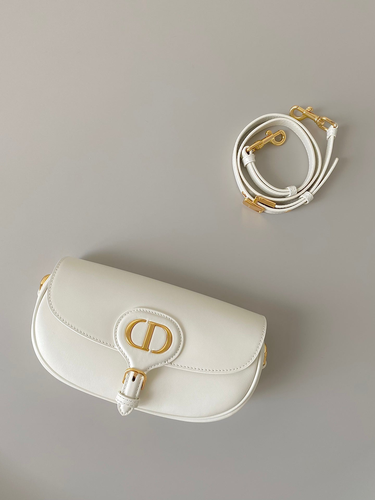 Luxury Diormedium east west bobby 22cm white calfskin ghw