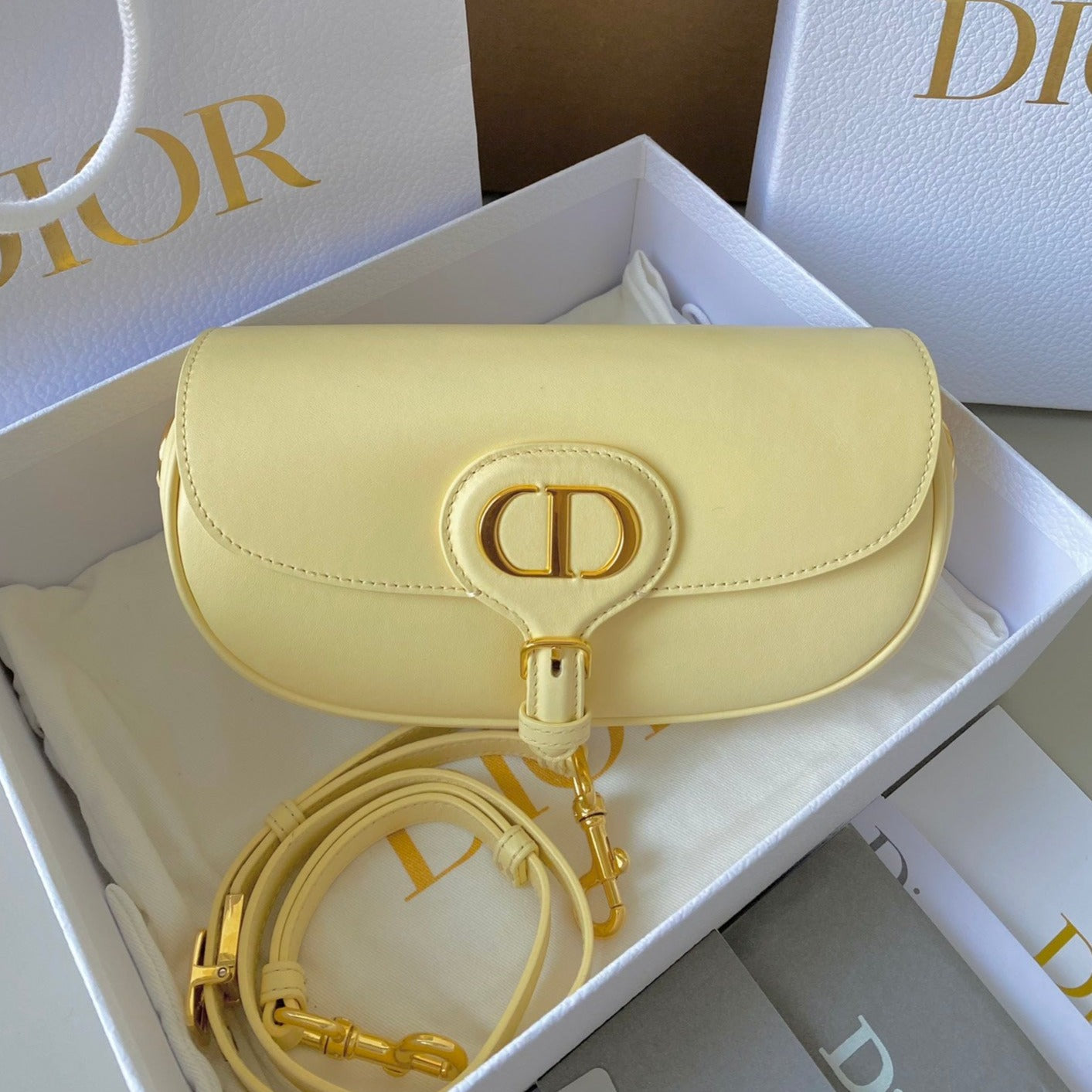 Luxury Diormedium east west bobby 22cm cream calfskin ghw